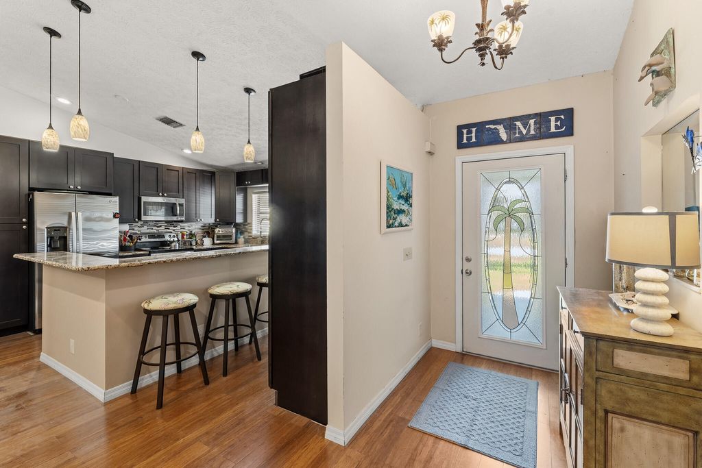 Photo of 4459 SE Kubin Avenue, Stuart, FL 34997 (MLS # B26031467)