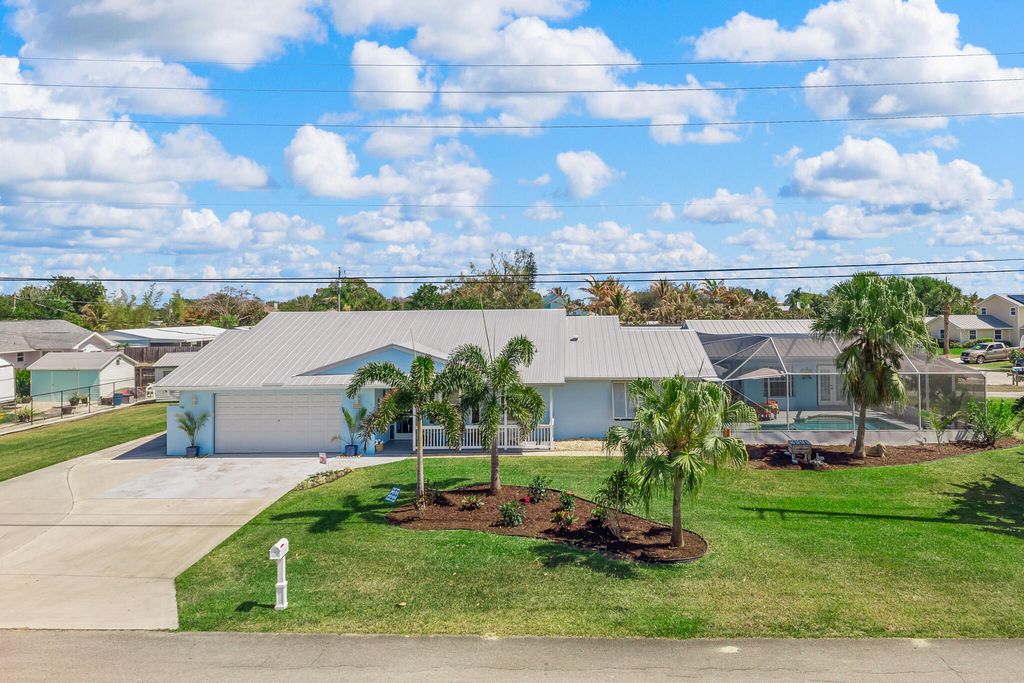 Photo of 4459 SE Kubin Avenue, Stuart, FL 34997 (MLS # B26031467)