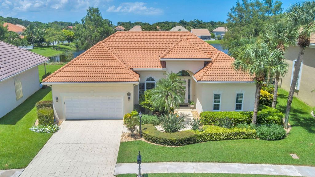 Photo of 135 Satinwood Lane, Palm Beach Gardens, FL 33410 (MLS # R10911044)