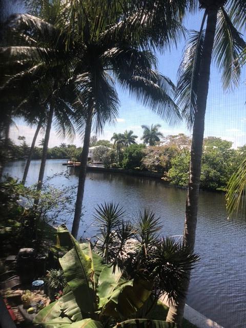 Just around the corner from Wilton Manors. This updated unit features a wonderful screened in balcony with an amazing water view especially at sunset. This renovated unit has all tile flooring with an open Kitchen/Living area with newer appliances, quartz counters, lots of built in storage cabinets and tasteful lighting accents. Accent lighting on the balcony as well. The bathroom was renovated in 2018. Relax at the waterfront pool with beautiful sunsets. Assigned parking for 1 car. Small pet OK with landlord and association approval. Pet deposit $250