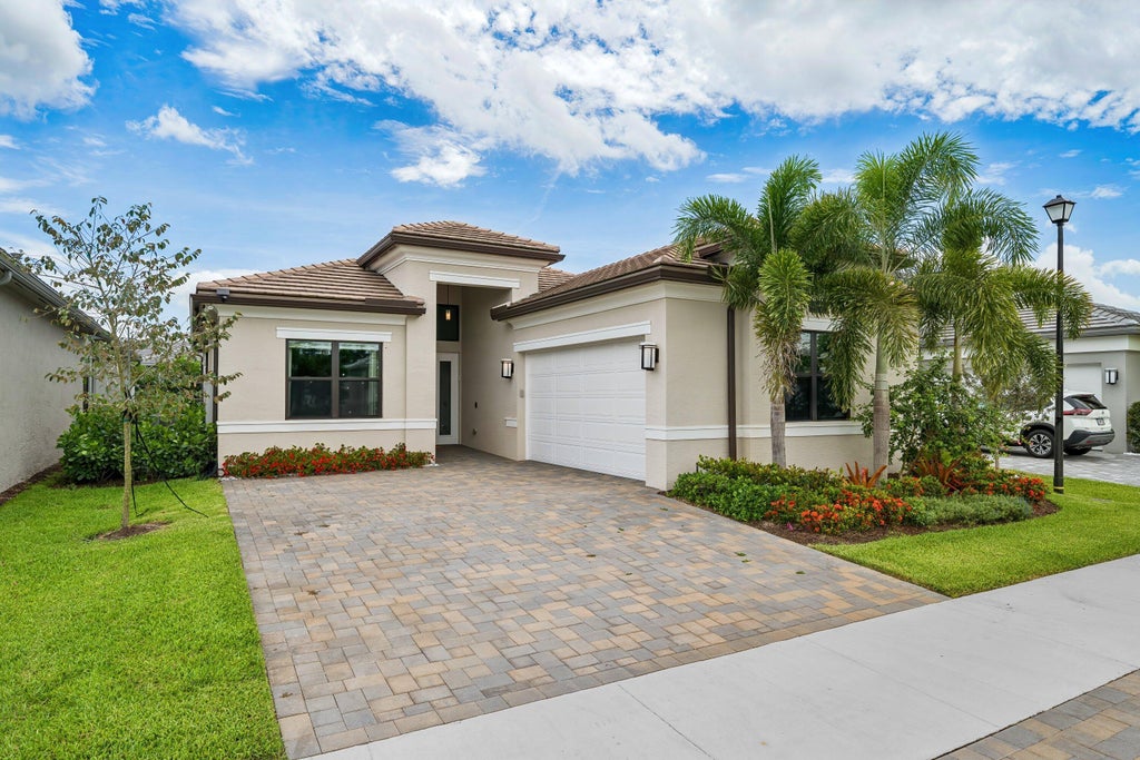 Photo of 9812 Spruce Woods Drive, Boynton Beach, FL 33473 (MLS # B26037522)