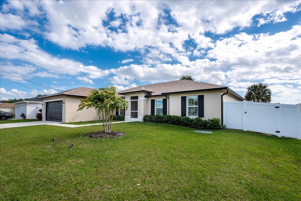 Photo of 1248 SW Mancuso Avenue, Port Saint Lucie, FL 34953 (MLS # R10959475)