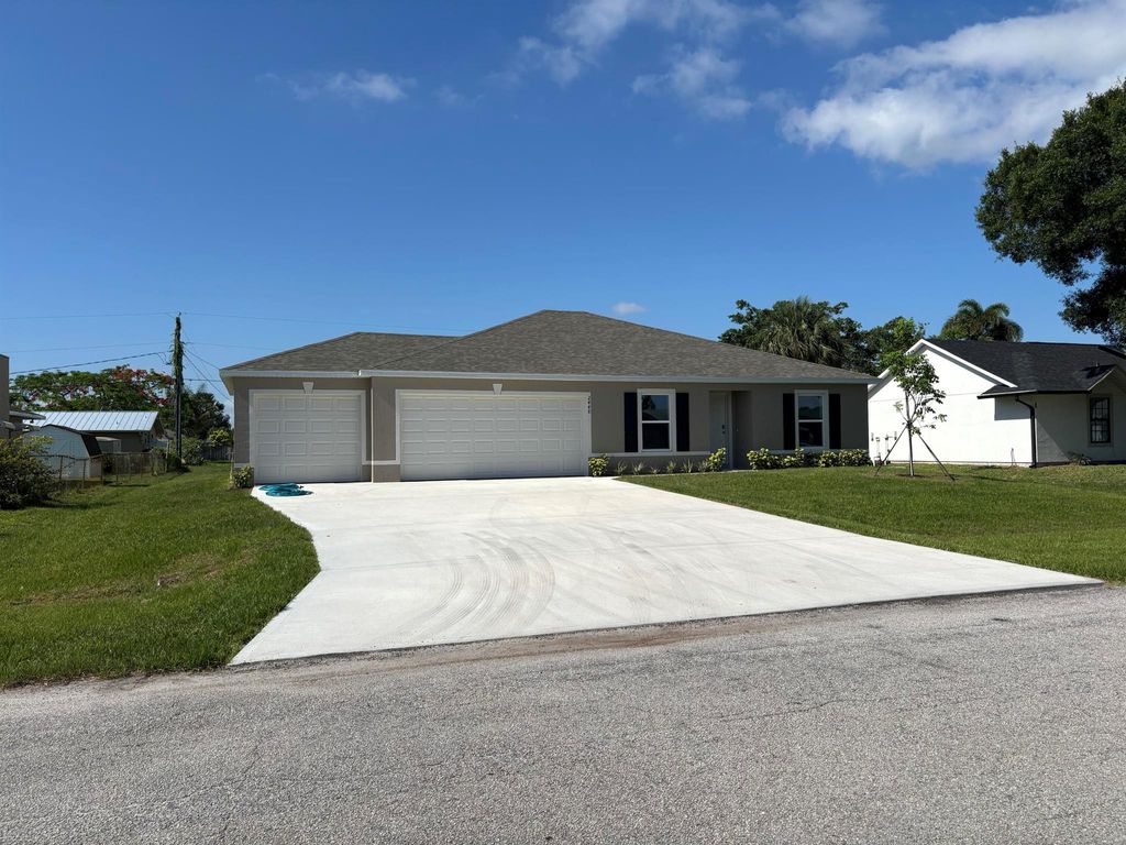 Photo of 2448 SE Pascal Avenue, Port Saint Lucie, FL 34952 (MLS # R11093397)
