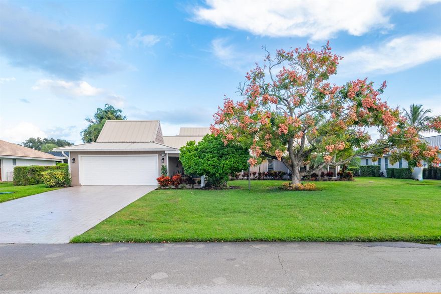 Welcome to YCC!  This particular 4 Bedroom, 4 Bath pool home boasts breathtaking golf course views and beautifully manicured landscaping.  The main level features the Owner's suite, a second en-suite with a cabana bathroom, a third bedroom and an additional full bathroom.  Upstairs, a spacious and private loft which could be an office or a 4th bedroom with full bath.  This upstairs has a separate spiral staircase entrance which would be perfect for guests or a home office.Florida living at it's best with an in-ground pool, manicured fenced in lawn area in back yard, perfect for your pet!  Yard has Dwarf Mangos trees, fig & avacodo too!Yacht & Country club is a gated community with Golf, Tennis and social memberships available but not mandatory!  Dining room chandelier does not con