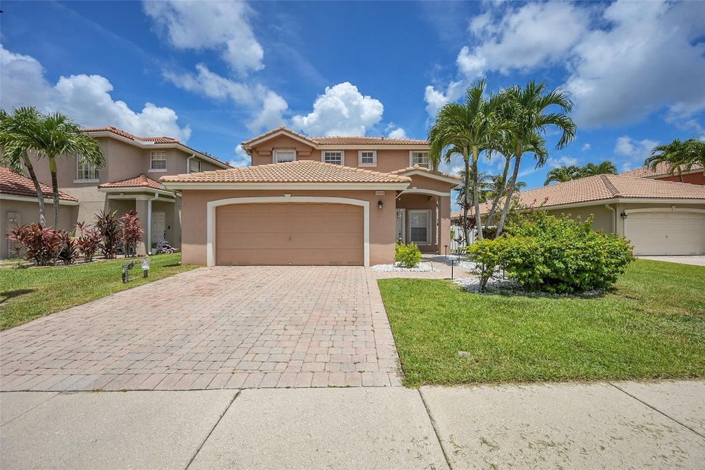 Photo of 3218 Turtle Cove, West Palm Beach, FL 33411 (MLS # F10511816)