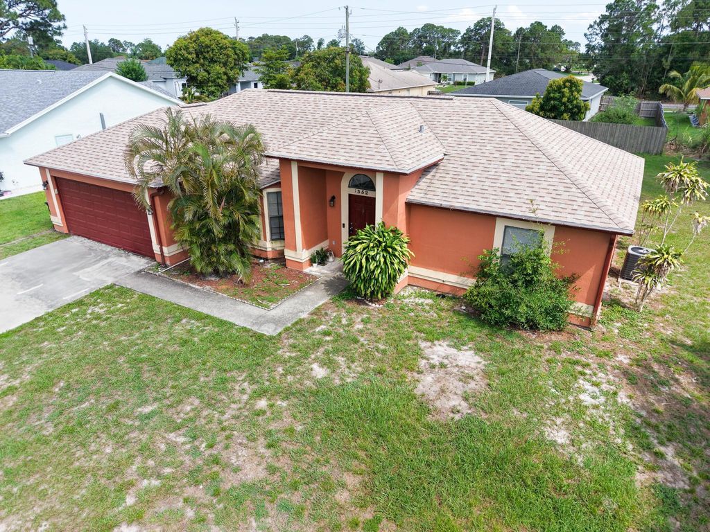Photo of 1352 SW Halford Avenue, Port Saint Lucie, FL 34953 (MLS # R11095212)