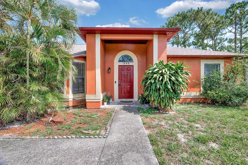 Photo of 1352 SW Halford Avenue, Port Saint Lucie, FL 34953 (MLS # R11095212)