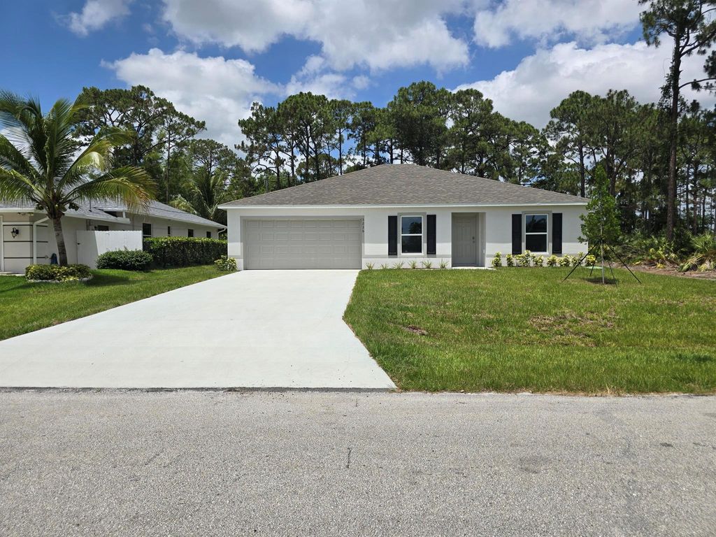Photo of 3226 SW Nutley Street, Port Saint Lucie, FL 34953 (MLS # R11092392)