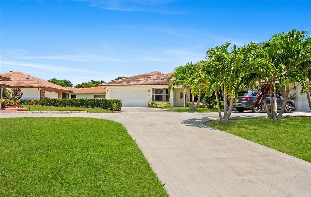 Photo of 375 NW 42nd Street, Boca Raton, FL 33431 (MLS # B26019624)