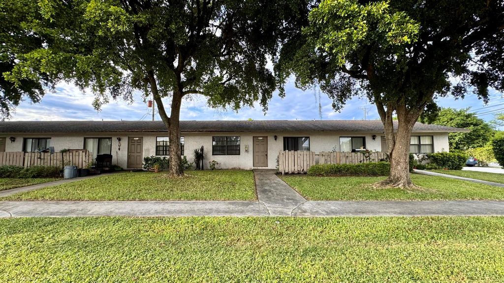 Photo of 3519 Melaleuca Lane, Lake Worth, FL 33461 (MLS # R11021479)