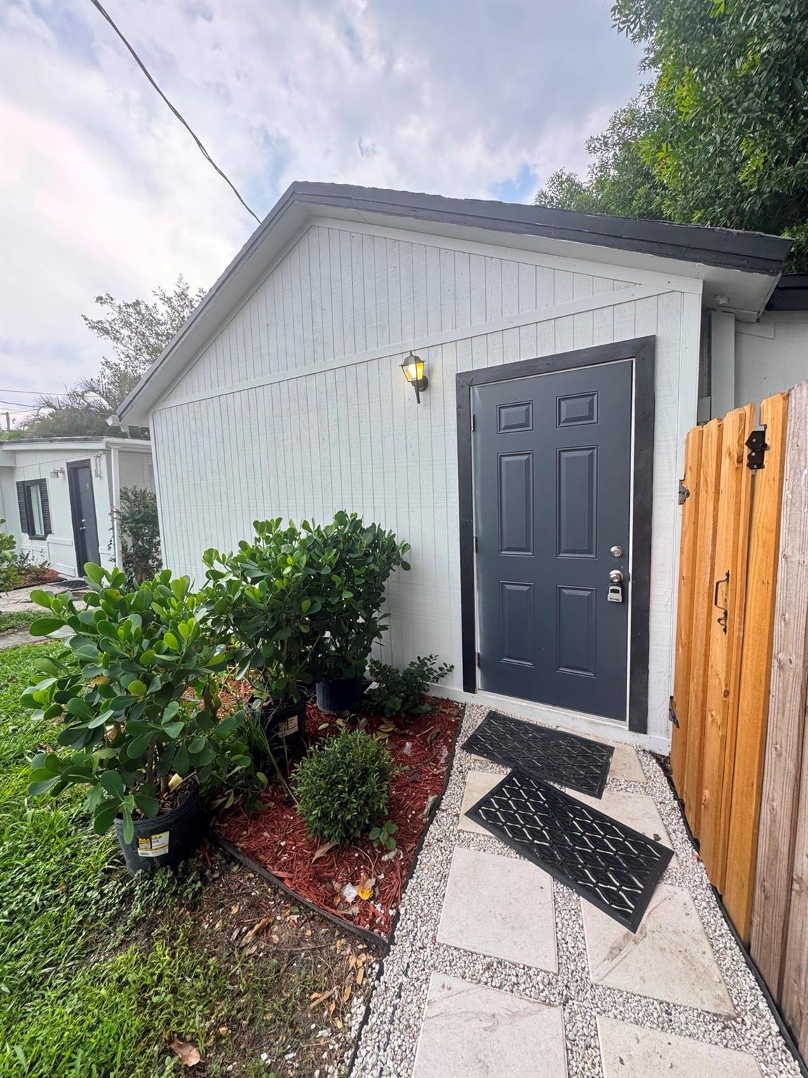 Charming and private 1/1. Updated kitchen, new appliances, tile throughout. Updated bathrooms, newly painted. Room sizes are approximate.