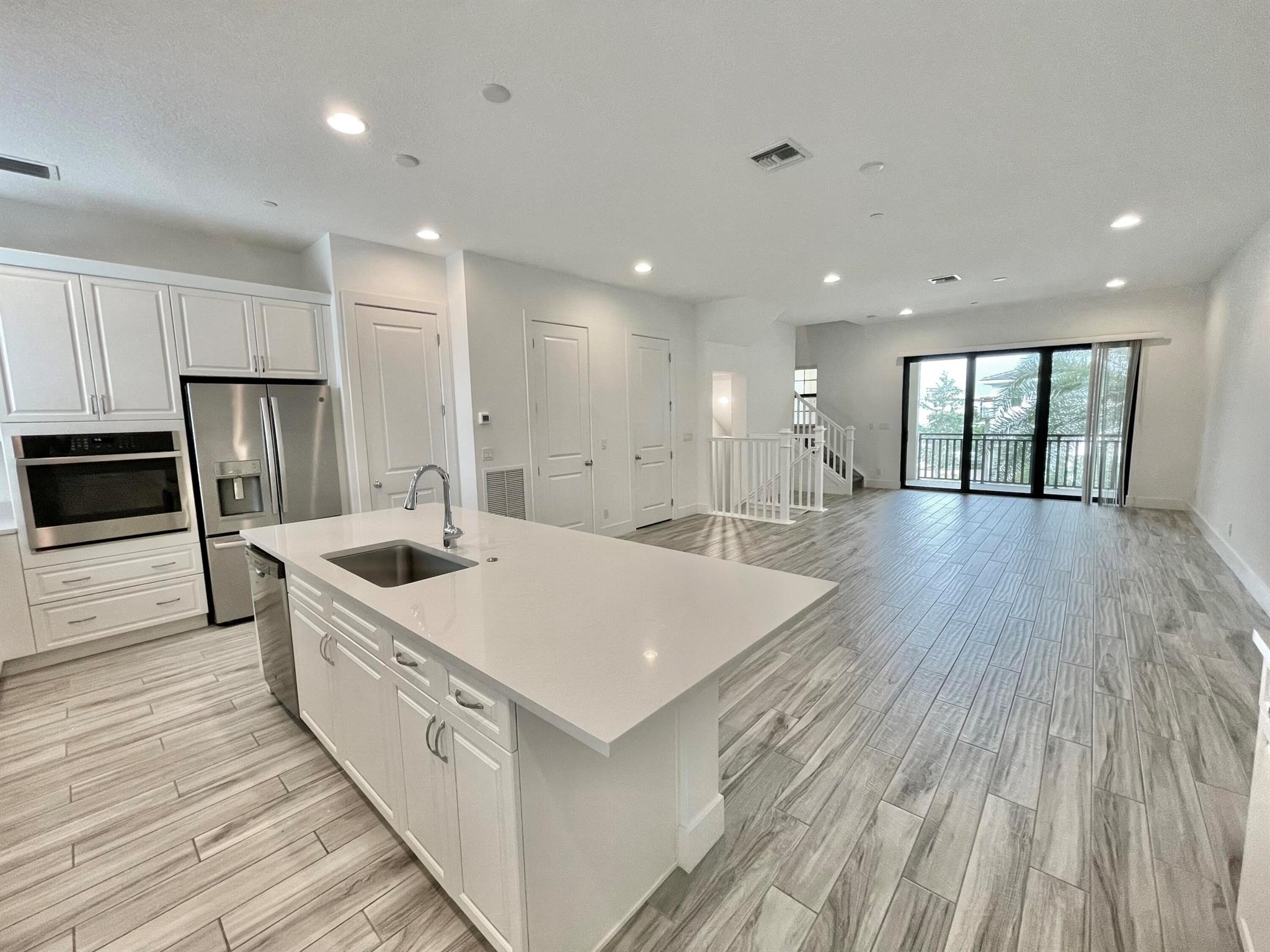 Newly constructed sleek and beautiful 4 Bedroom 3.5 baths, 2 car garage, 3-story townhouse in Alton. Unfurnished annual lease. Available starting mid October 2025. Expansive open layout. Modern kitchen. Very clean and well maintained. Massive primary suite and closets. Close to everything! Resort style amenities like pool, fitness, cabanas, beach volleyball, tennis, playground, dog park are all included when you live in Alton. 5412 Watts is close to all the clubhouse and resort style amenities, the dog park, playground, and all the shops and dining at Alton Town Center as well as I-95, Abacoa, the beaches, and everything in PBG and Jupiter. Pets may be considered on a case by case basis and is up to the owners discretion. Best deal in Alton so don't miss it!