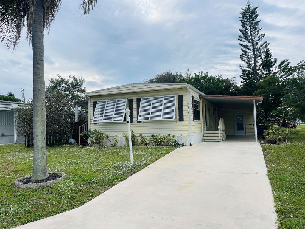 Photo of 7680 SE Eagle Avenue, Hobe Sound, FL 33455 (MLS # R10922735)