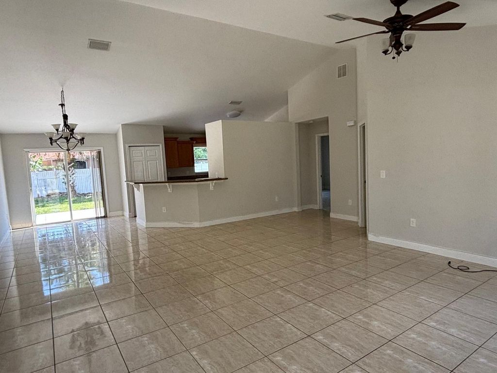 Photo of 1341 SW Oriole Lane, Port Saint Lucie, FL 34953 (MLS # R10987009)
