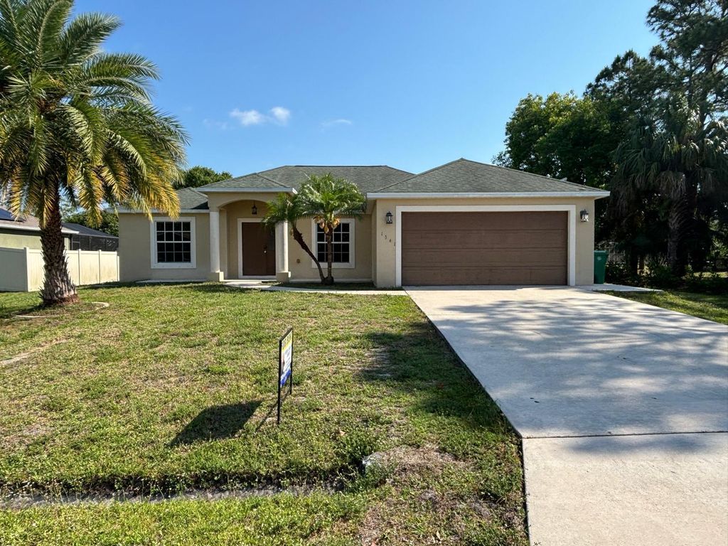 Photo of 1341 SW Oriole Lane, Port Saint Lucie, FL 34953 (MLS # R10987009)
