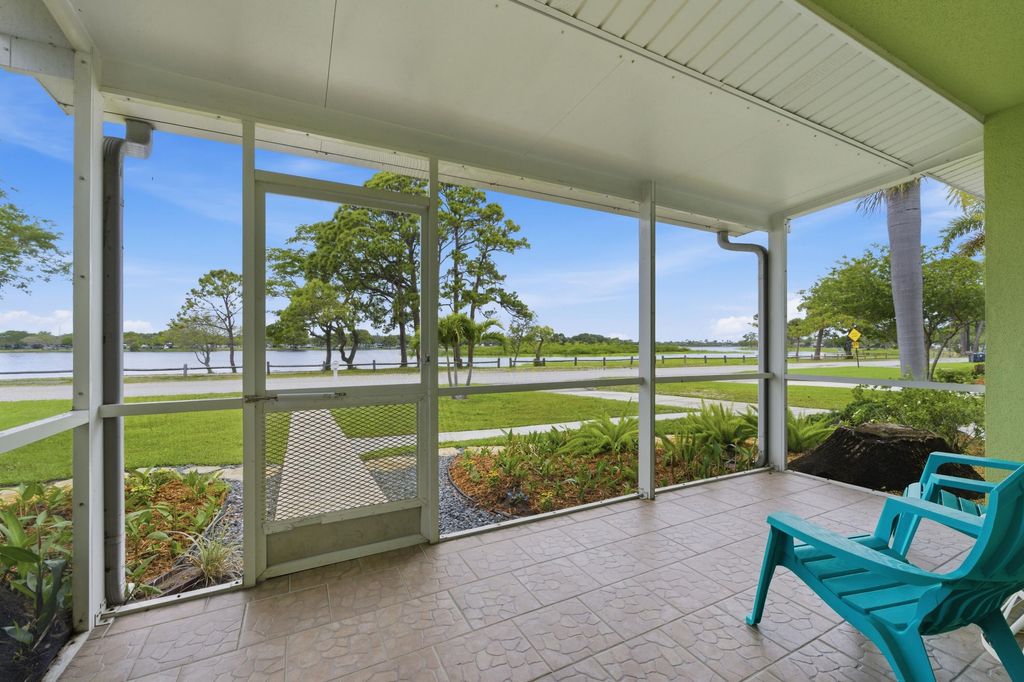 Photo of 5650 Lake Osborne Drive, Lake Worth, FL 33461 (MLS # B26018552)