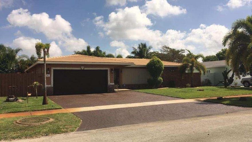 MUST SEE! Well maintained 4 bed/ 2 bath home in a very sought after neighborhood in North Lauderdale. This amazing well maintained home comes with an enclosed patio 13x33', great for entertaining + family gathering over looking the pool deck. Surroundeding palm trees standing 20ft high! With a basketball court in the corner of the home along with a shed. Well manicured yard with well pump water to keep the grass green. Plenty of space for a growing family. It won't last long. First come, First serve.