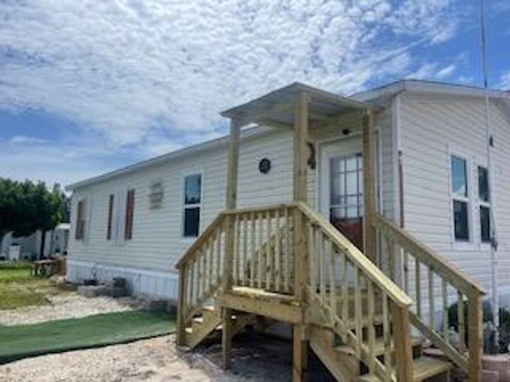 Photo of 8075 SE Wren Avenue, Hobe Sound, FL 33455 (MLS # R10899688)