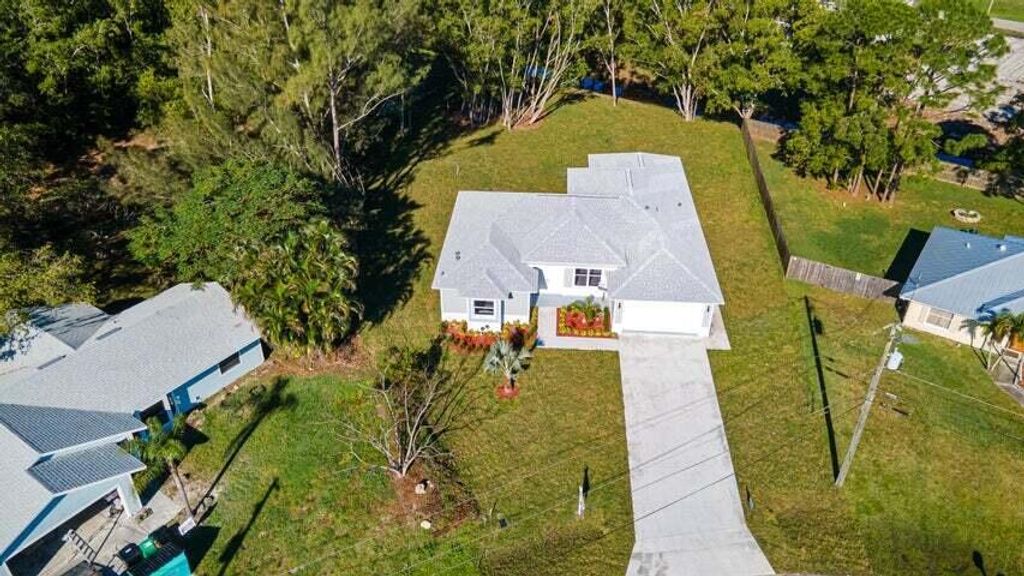 Photo of 419 SW Namoit Place, Port Saint Lucie, FL 34953 (MLS # R10952616)