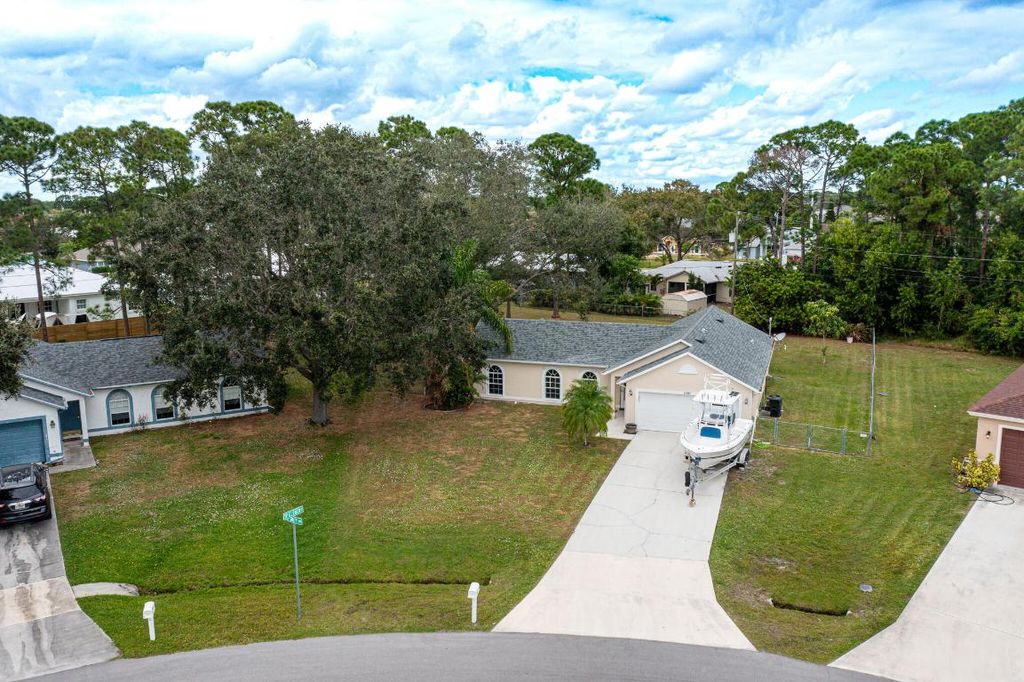 Photo of 1997 SW Swift Avenue, Port Saint Lucie, FL 34953 (MLS # R10935078)