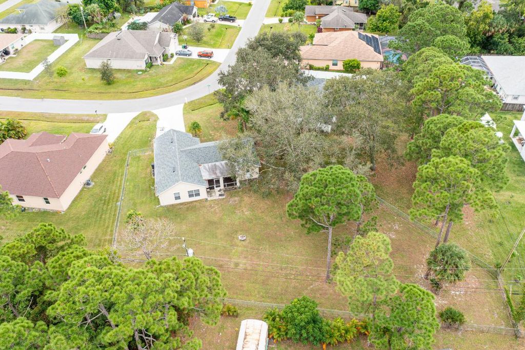 Photo of 1997 SW Swift Avenue, Port Saint Lucie, FL 34953 (MLS # R10935078)
