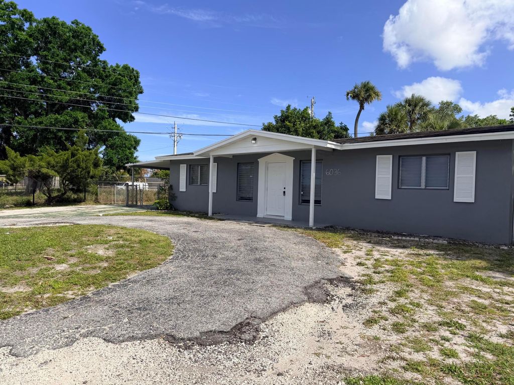 Photo of 6036 Westover Road, West Palm Beach, FL 33417 (MLS # B26014302)