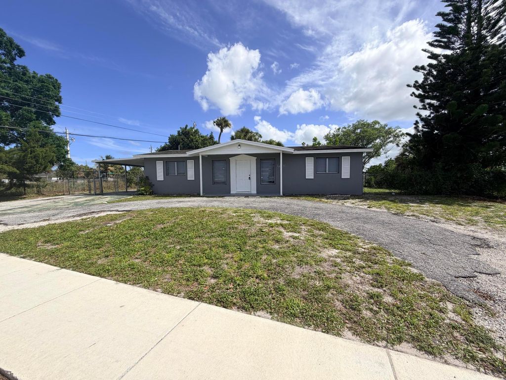 Photo of 6036 Westover Road, West Palm Beach, FL 33417 (MLS # B26014302)