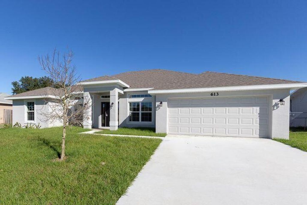Photo of 1666 SW Ocean Cove Avenue, Port Saint Lucie, FL 34953 (MLS # R10811142)