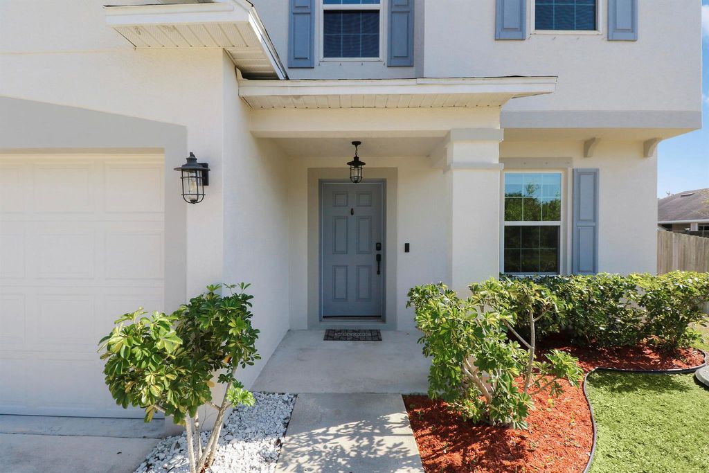 Photo of 1382 SW Oriole Lane, Port Saint Lucie, FL 34953 (MLS # R11002584)
