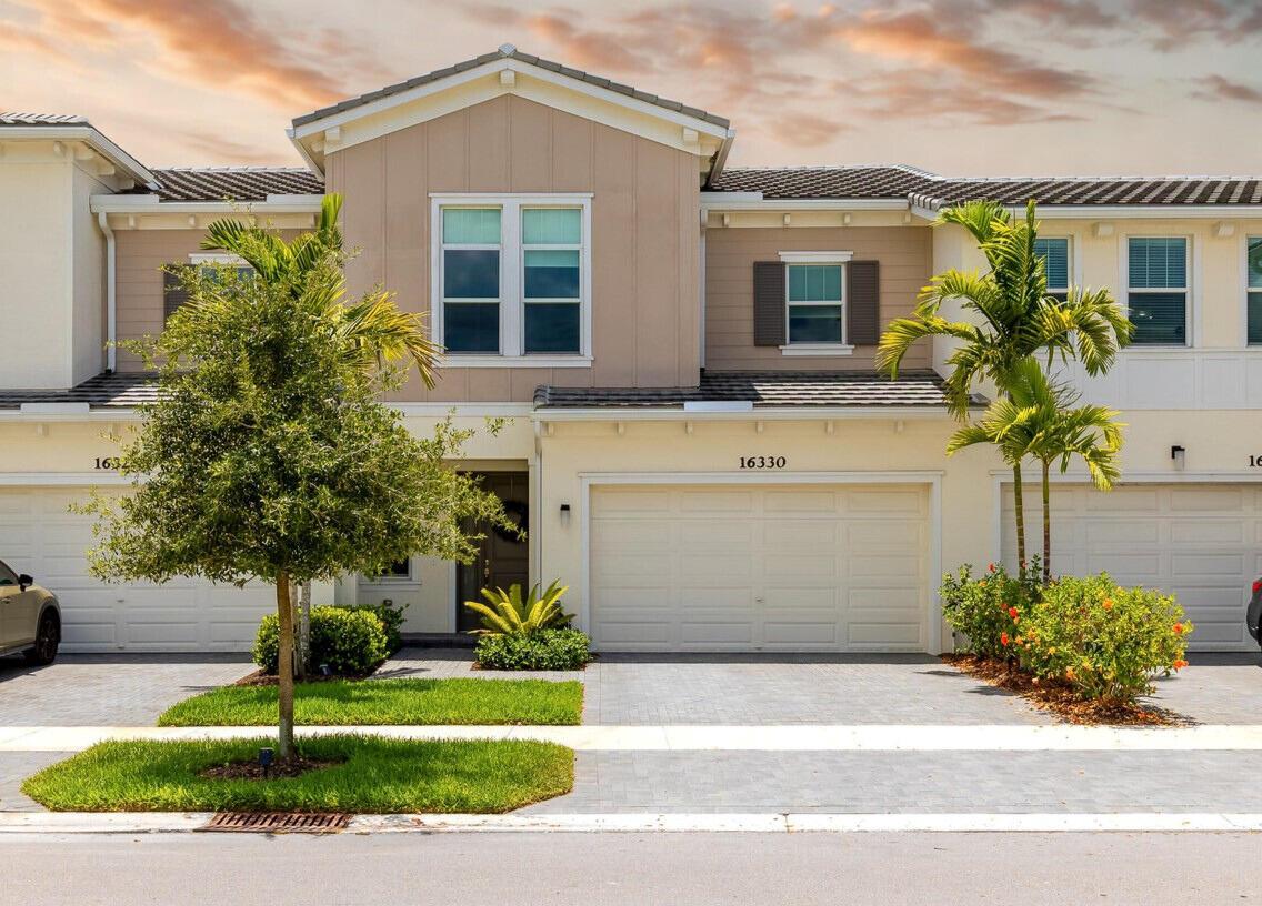 Why settle for smaller, less-upgraded new construction when you can own one of Westlake's (WPB) largest luxury townhomes, fully built, beautifully upgraded, and ready now? The largest model available at 2,138 sq ft offers more space, higher-end finishes, and a more functional layout than the builder's new releases. Add the private, fenced backyard overlooking lush, mature landscaping, and it feels like a single-family home! This is a rare resale opportunity in a townhome community where no more units like this are being built. Energy-efficient with impact windows, natural gas tankless hot water heater, variable-speed HVAC, an Ecobee smart thermostat, and a 2-car garage with epoxy floors. Seller may offer additional incentives with a strong offer. Veterans with VA loans are welcomed!