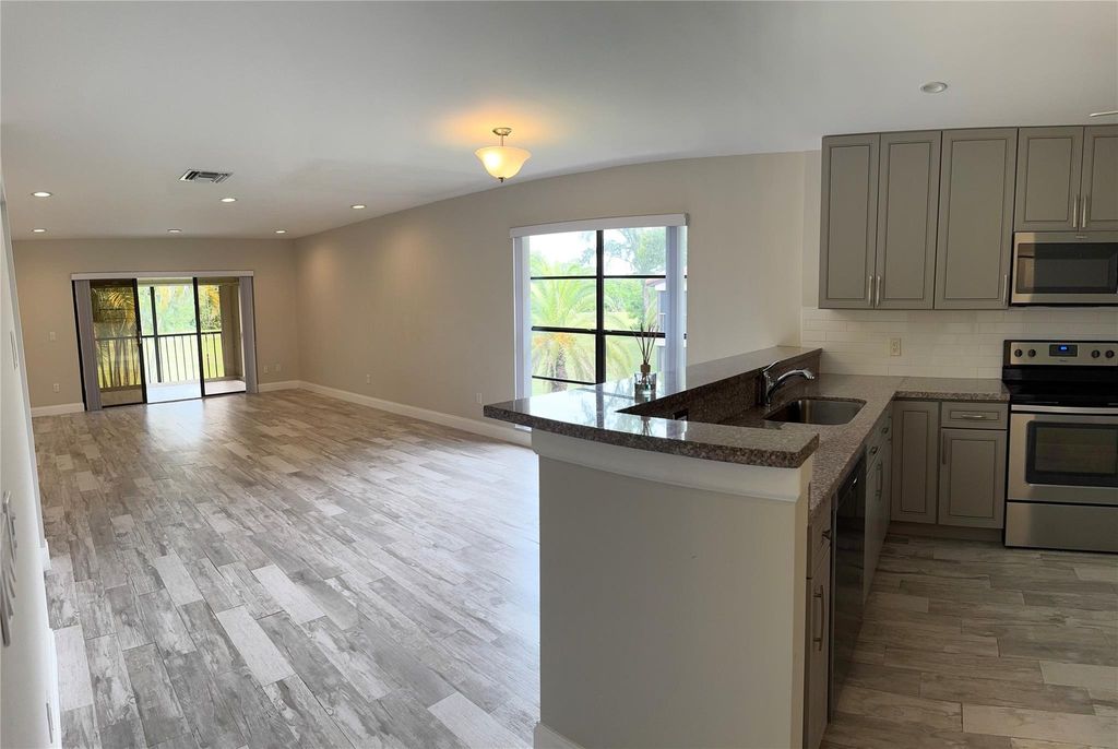 Photo of 9274 Vista Del Lago, Boca Raton, FL 33428 (MLS # F10506956)