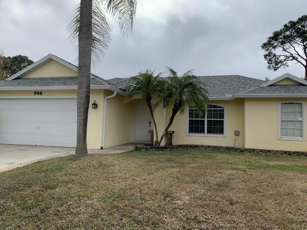 Photo of 998 SW N Globe Avenue, Port Saint Lucie, FL 34953 (MLS # R11155684)
