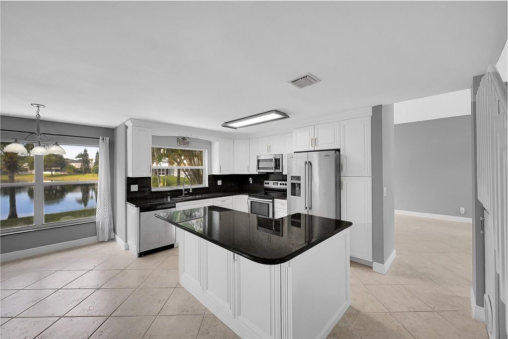 Photo of 8236 White Rock Cir, Boynton Beach, FL 33436 (MLS # F10539779)
