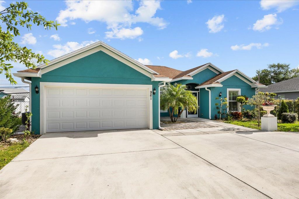 Photo of 961 SW Consolata Avenue, Port Saint Lucie, FL 34953 (MLS # B26012385)