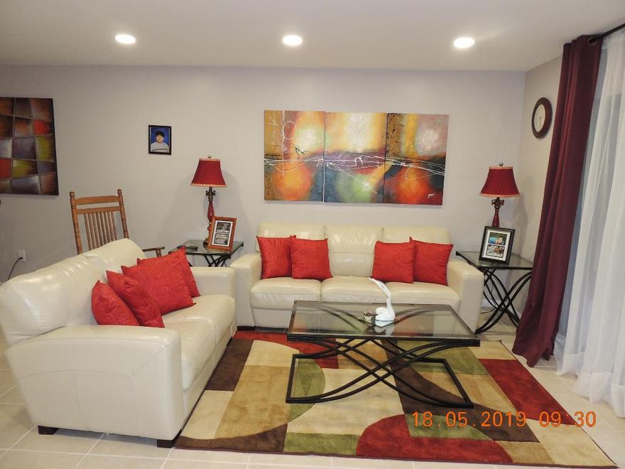 MOTIVATED SELLER !! STOP LOOKING, HERE'S YOUR PERFECT NEW HOME. 2 bedroom 2 bath, light and bright, lovely corner unit condo.  Backyard view of garden and neighboring Golf Club.  Quiet  and clean community  Large enclosed veranda  with storage space. Adorable kitchen with room for eat in table. AC 2011. Yes, is immediately LEASABLE. Walking distance to shops, and schools and golf club  closeby. Community has 2 pools.  2 parking spaces. Pet under 25lbs permitted. So what are you waiting for? Come see for yourself this is the perfect opportunity to own or lease in a great condo development.