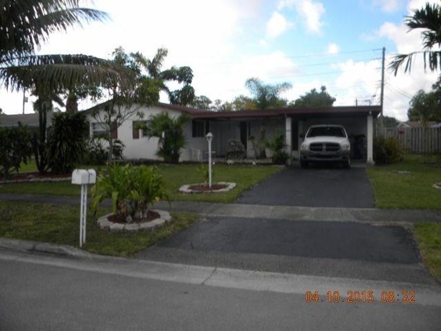 Approved Short Sale. 3 Bedroom 2 Bath. Terrazzo flooring.  One Car  Carport and Large, Private  Fenced Yard. Screened patio. Investor Special. House needs work.