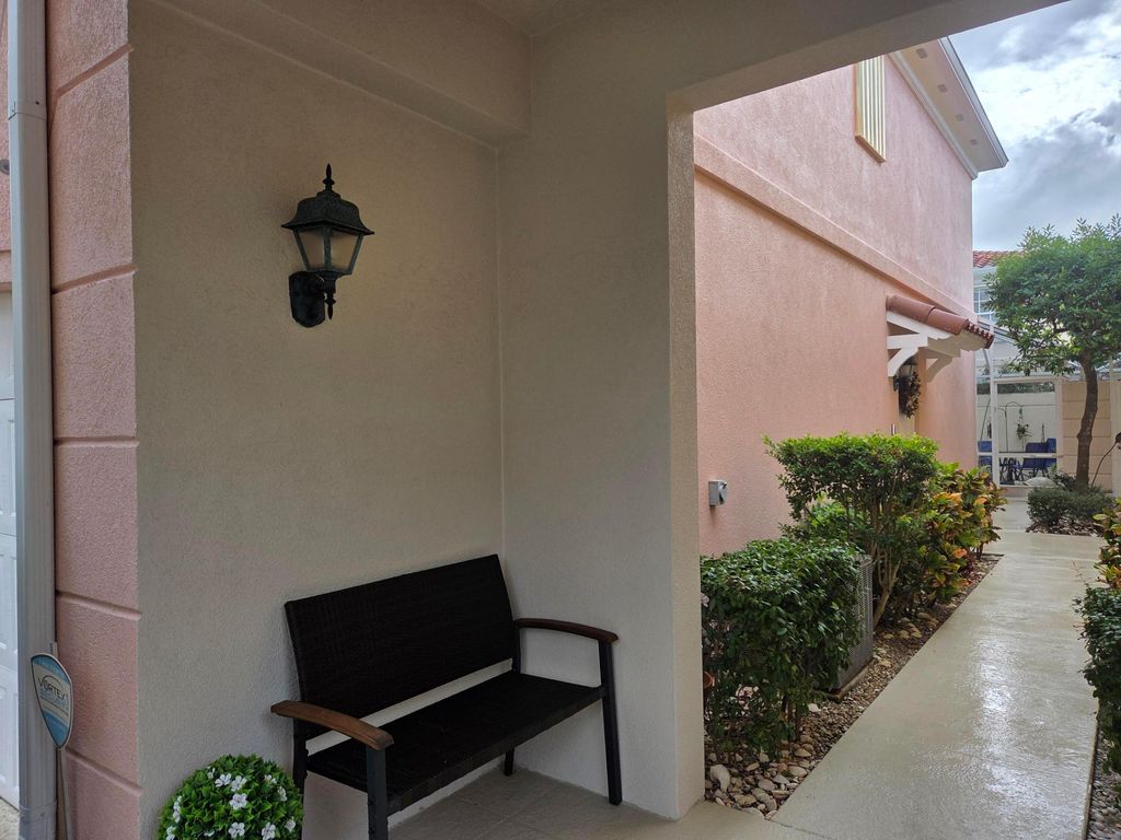 Photo of 58 Tall Oaks Circle, Tequesta, FL 33469 (MLS # R11152718)