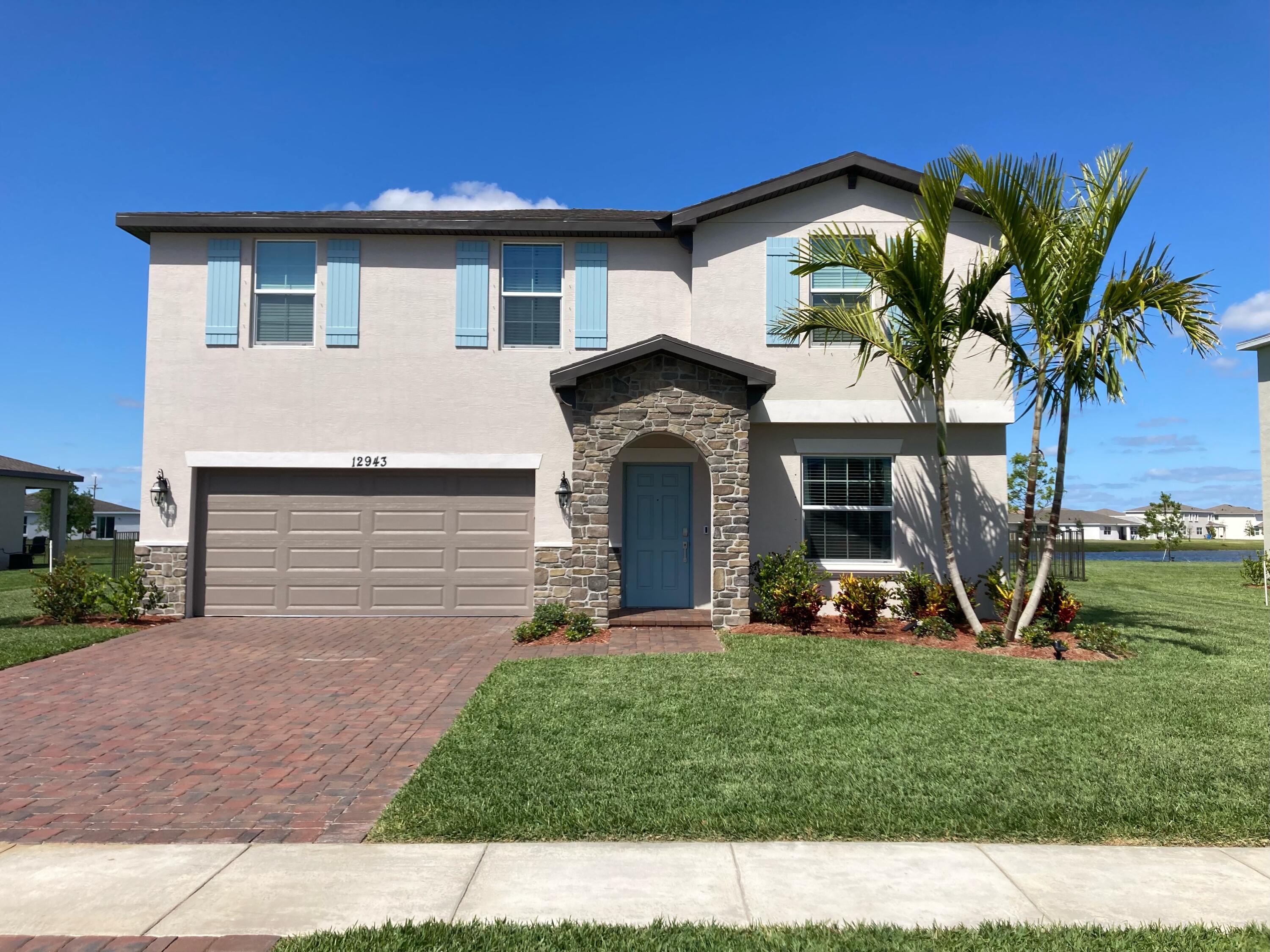 A gorgeous modern 4 bd, 2.5 ba two story Lennar smart home in the highly sought gated community of Copper Creek. This two-story home was designed for comfortable family living with a spacious first floor that opens to a shared space among the family room and kitchen, with rear patio access to a large, fenced yard. Right off the entryway is a multipurpose flex room. Large kitchen island with quartz countertops and updated tiled backsplash. The second floor contains a versatile loft with four bedrooms and a peaceful owner's suite overlooking the beautiful backyard and lake. Community amenities include clubhouse with resort style gym, sports courts, and playground. Easy access to I-95, St. Lucie West, and Tradition.