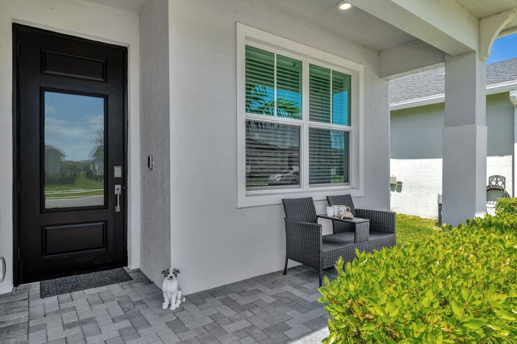 Photo of 765 SE Bloomfield Road, Port Saint Lucie, FL 34984 (MLS # R11084397)