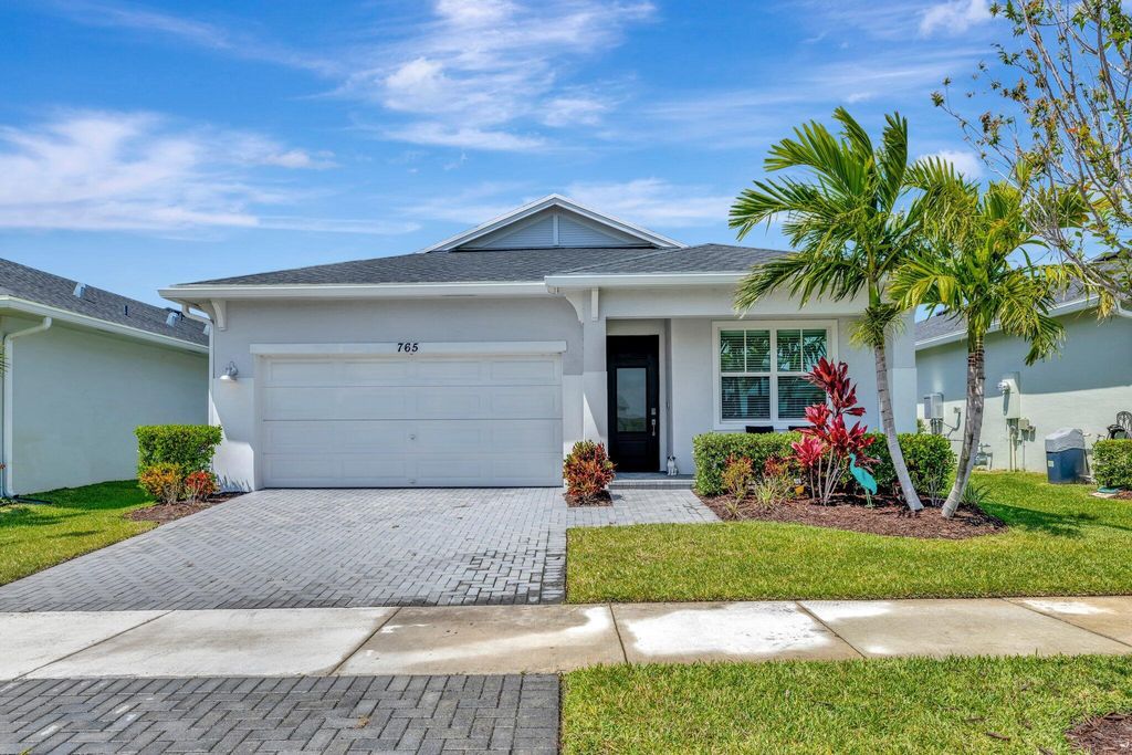 Photo of 765 SE Bloomfield Road, Port Saint Lucie, FL 34984 (MLS # R11084397)