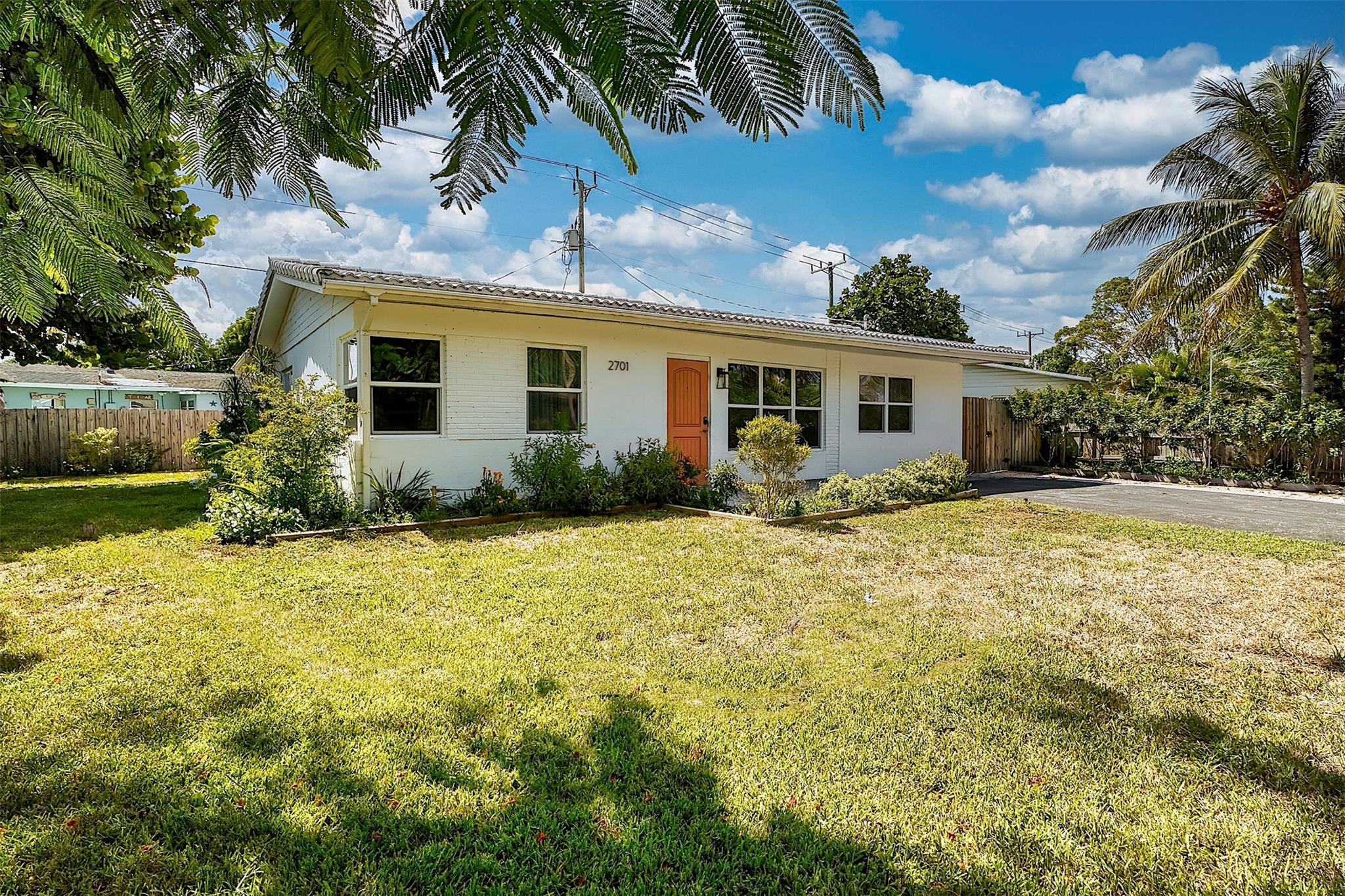 Beautifully updated 4-bedroom, 2-bath home with approx 1,600 sq. ft. of living space. Features a 2014 roof, impact windows and doors, updated plumbing, and a flawless 4-point inspection passed in 2024 for true peace of mind. The updated kitchen is a standout, featuring quartz countertops, tile backsplash, wine cooler, abundant cabinet space, and a brand-new refrigerator. Additional updates include an A/C (2018) and hot water heater (2019). Tile flooring flows throughout, and the home sits on a newly and professionally landscaped lot that adds exceptional curb appeal. This move-in ready property combines comfort and style in a prime Pompano Beach location, with excellent potential for income production.