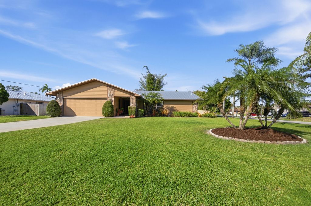 Photo of 1199 SE Proctor Lane, Port Saint Lucie, FL 34983 (MLS # B26022291)