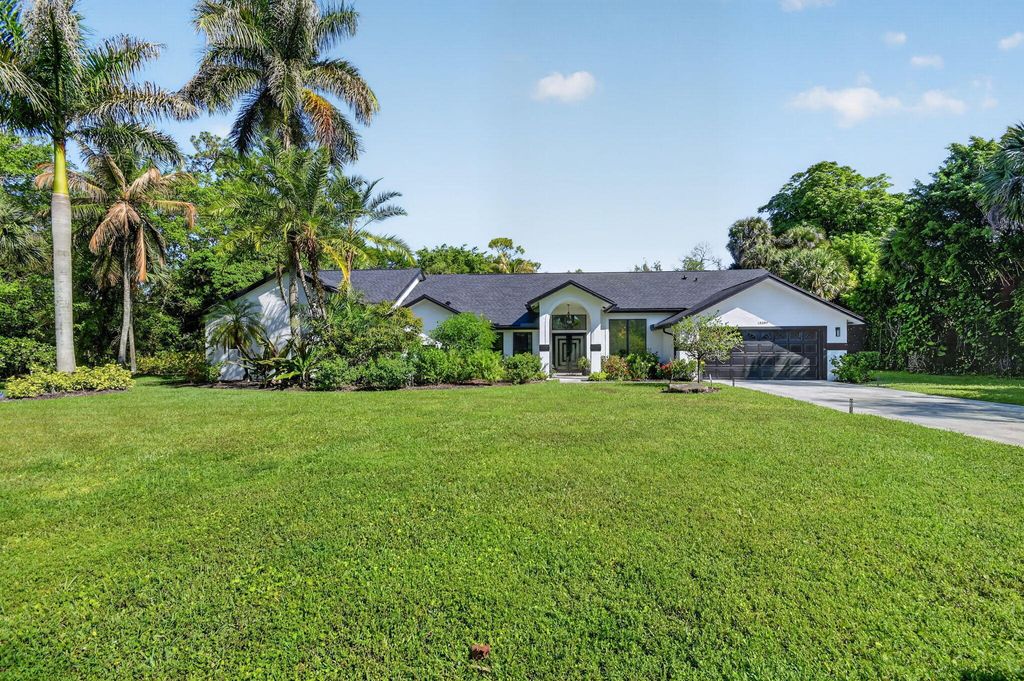 Photo of 13399 Doubletree Circle, Wellington, FL 33414 (MLS # B26034300)