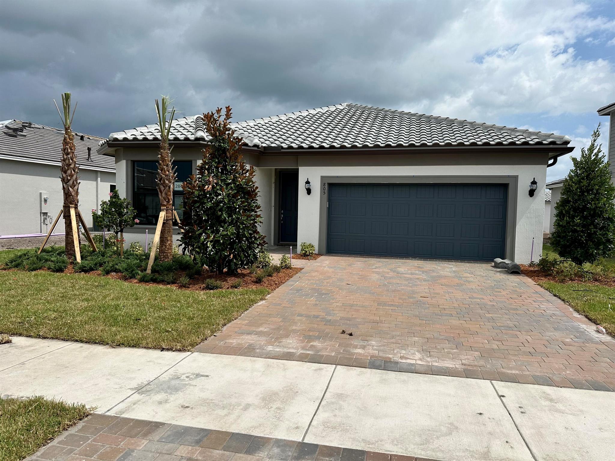 NEW CONSTRUCTION without the wait in the Final Phase of this beautiful community. This highly desirable ranch home has 3 Bedrooms and 2.5 Baths. Lanai has been extended and has two sets of sliders to enjoy your Water view. Home has been elegantly upgraded with on-trend finishes Estimated completion is Oct 2023