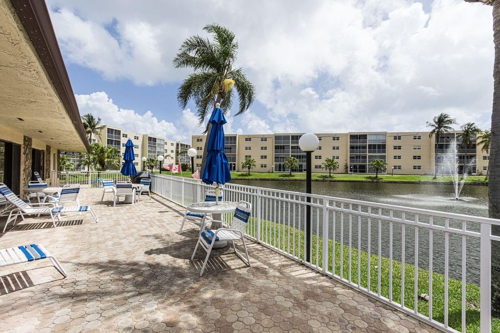 Photo of 414 SE 10th Street #102, Dania Beach, FL 33004 (MLS # B26016139)