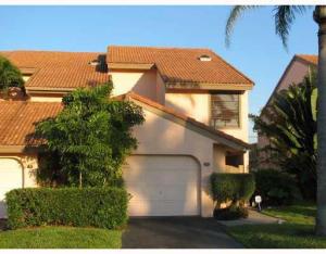 Equal Housing Opportunity. FULLY FURNISHED. Incredible 3 bedroom, 2.5 bath, 1 car garage townhome on the water! This unit is offered fully furnished only. Granite counters, stainless steel appliances, tile downstairs and laminate floors upstairs. Skylights throughout upstairs make it light and bright. Huge screened and covered patio overlooks the lake. Plenty of storage throughout the townhouse. Nice gated and private courtyard on the front leading to the front door. Incredible community close to Palm Beach Outlet Mall, I95 and plenty of dining. Up to 2 cars allowed, up to 2 pets allowed, no aggressive breeds.