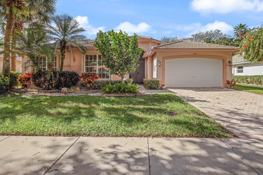 Photo of 11348 Ohanu Circle E, Boynton Beach, FL 33437 (MLS # R11156421)