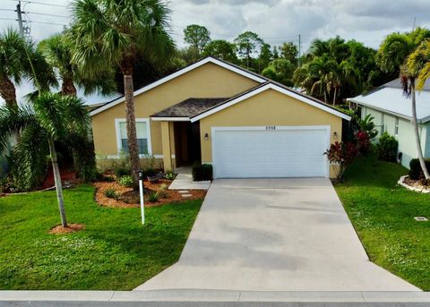Photo of 8998 SW Bonneville Drive, Stuart, FL 34997 (MLS # R11089459)