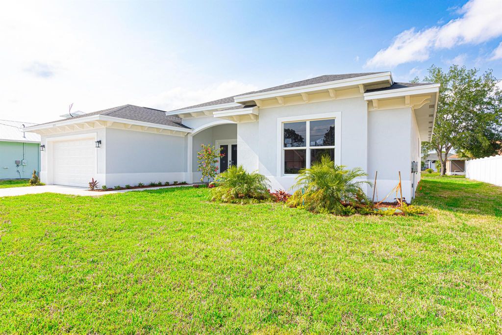 Photo of 5853 NW Culebra Avenue, Port Saint Lucie, FL 34986 (MLS # R11091133)