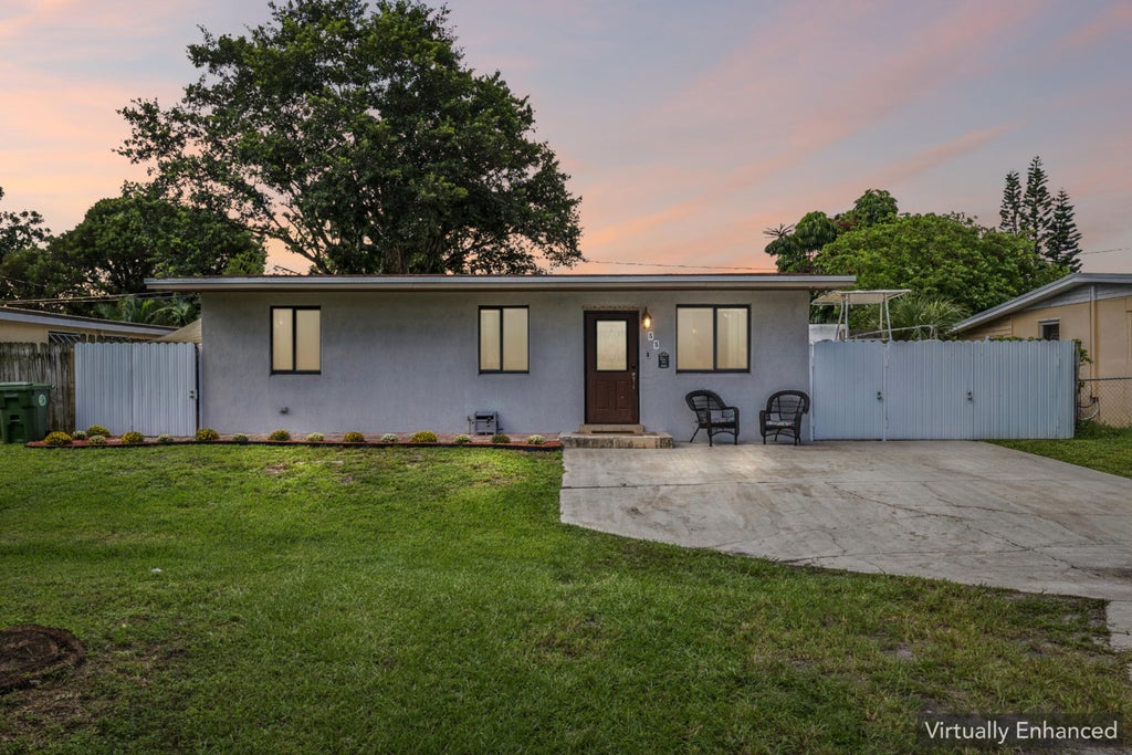 Photo of 55 Davis Road, Palm Springs, FL 33461 (MLS # B26080174)